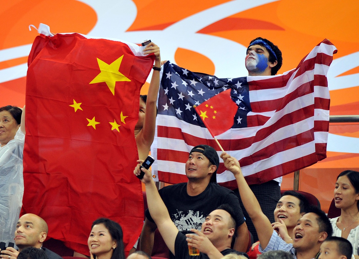 Aug. 9, 2008 - China's National flag and the US flag are displayed by fans in the 2nd quarter of their opening round contest at Olympic Basketball Stadium in the Games of the the XXIX Olympiad in Beijing, China. USA defeated China 101-70. (Joe Rimkus, Jr/Miami Herald/MCT), Image: 212413407, License: Rights-managed, Restrictions: , Model Release: no, Credit line: Profimedia, Zuma Press - Archives